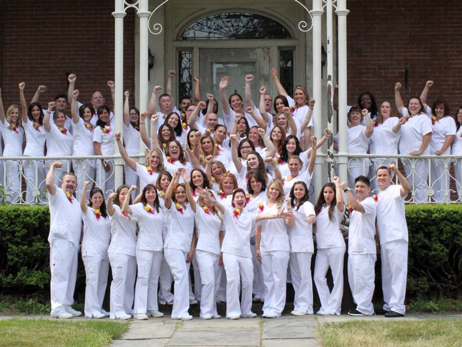 Nursing students celebrating at Pinning Ceremony