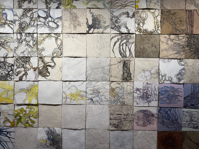 tiles with spooky strings drawn on