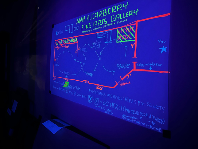 a map of the gallery glowing in a black light