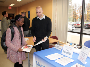 student talking to employer at career fair