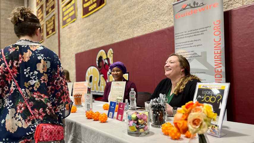 employer at career fair table